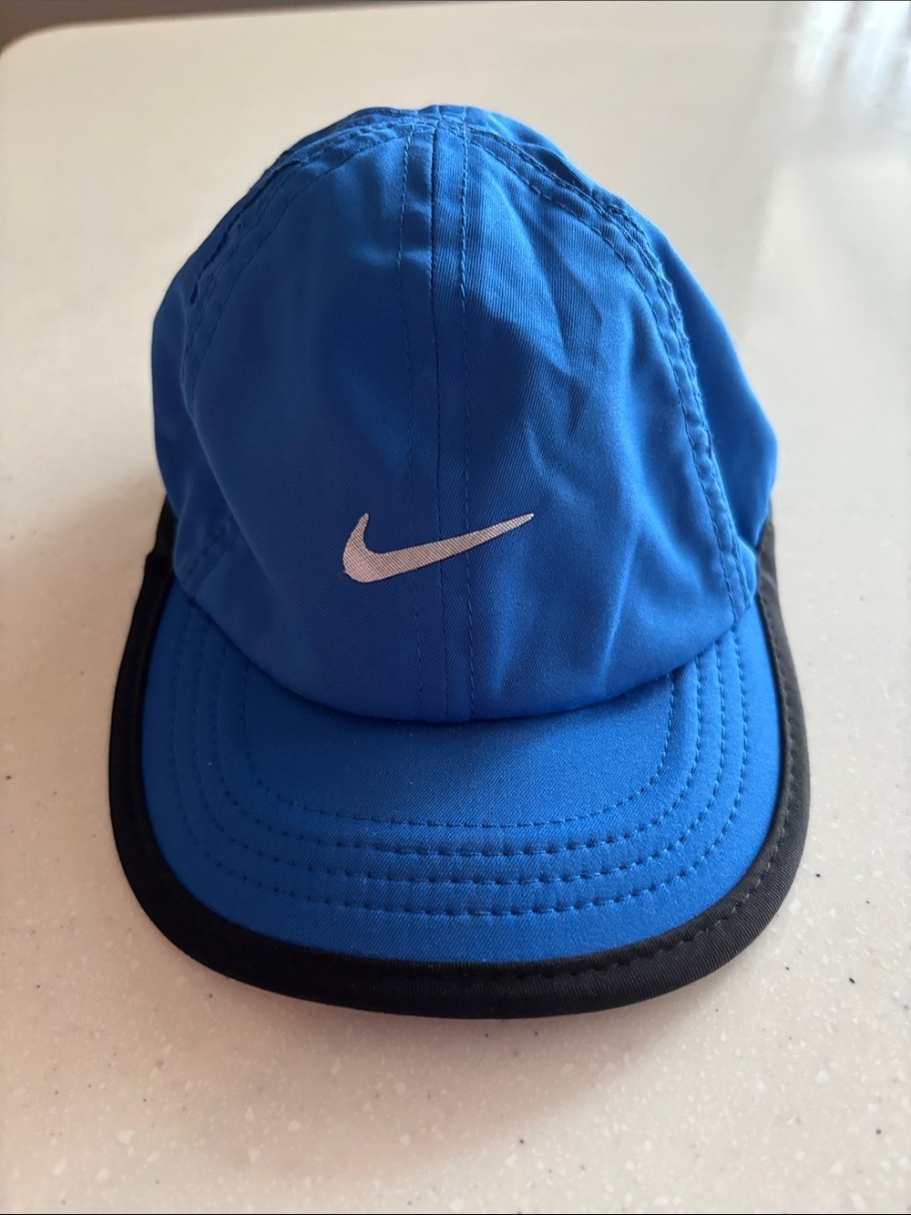 Infant Nike Bright Blue Cap with Black Trim and White Swoosh